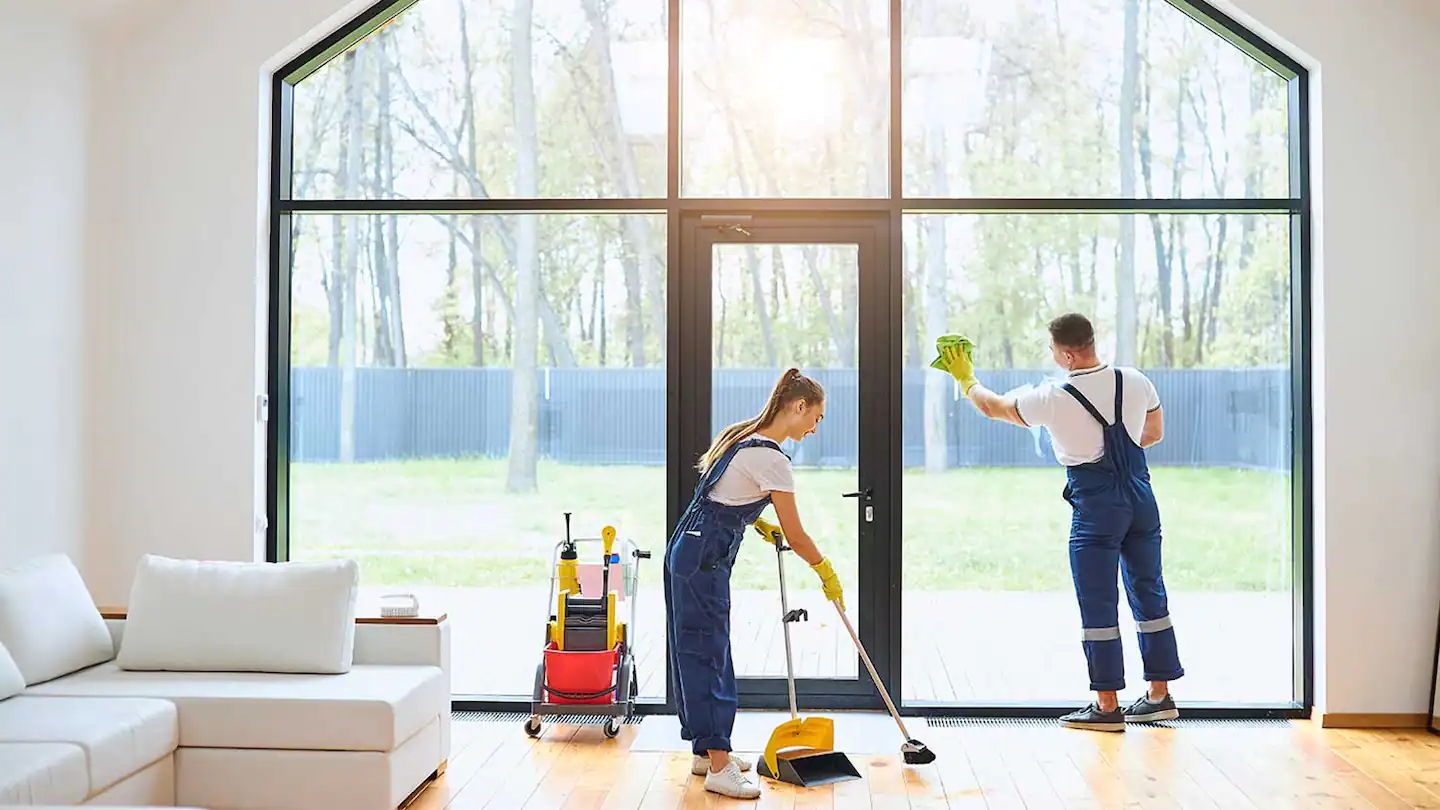 house-cleaners-cleaning Commercial cleaner sanitizing workspace in Raleigh business office