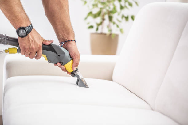 Chemical sofa depth cleaning by a professional. Bright Leaf Cleaning staff deep cleaning Angier NC commercial office