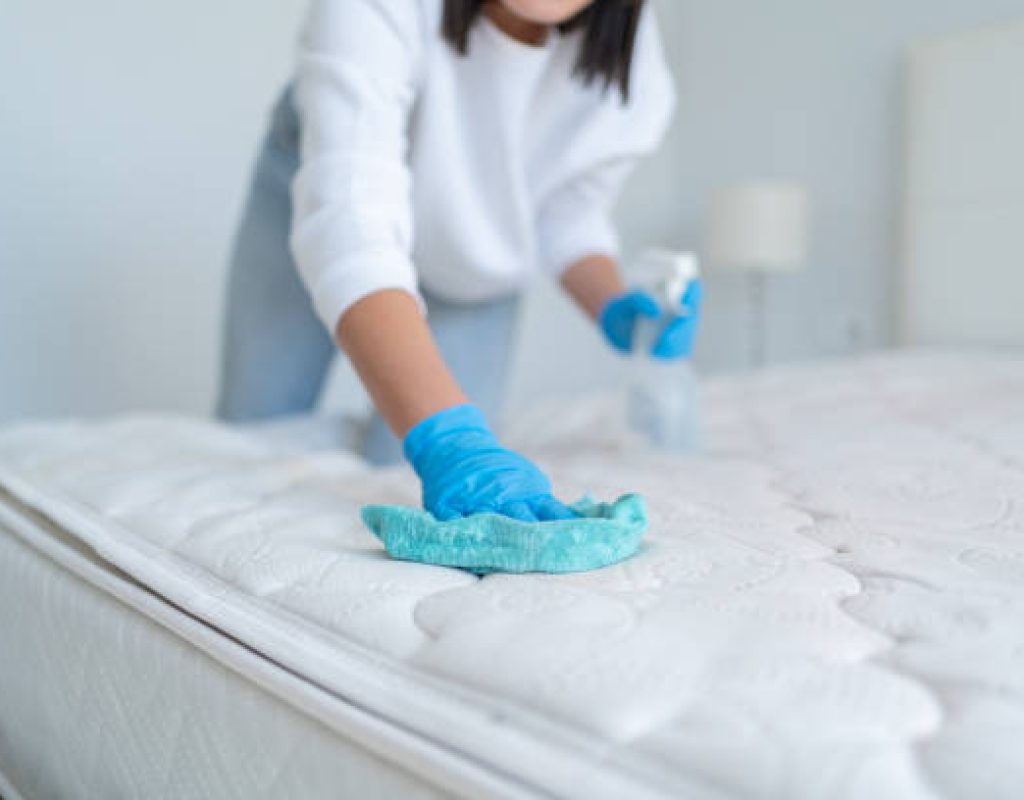 Bright Leaf Cleaning staff disinfecting high touch surfaces in home interior